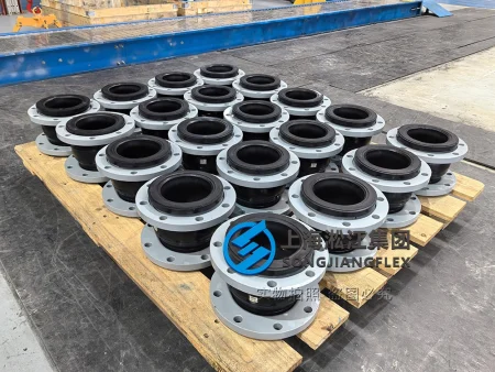 DN100 PN16 heavy-duty natural rubber compensator with carbon steel flanges, specifically designed for high-frequency vibration tables in continuous casting plants.