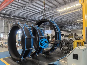 DN2400 PN6 large diameter hand-built EPDM rubber compensator with carbon steel flanges and heavy-duty control rods for condenser systems.