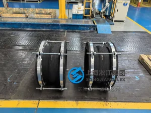 DN400 PN25 heavy-duty rubber expansion joint featuring hand-built wear-resistant natural rubber, carbon steel flanges with control units, and 100% vulcanized full face sealing for abrasive slurry.