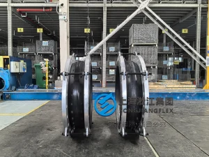 DN700 PN16 heavy-duty rubber flexible joint, molded EPDM rubber expansion joint with SS304 vacuum ring, galvanized flanges with control units for wastewater discharge.