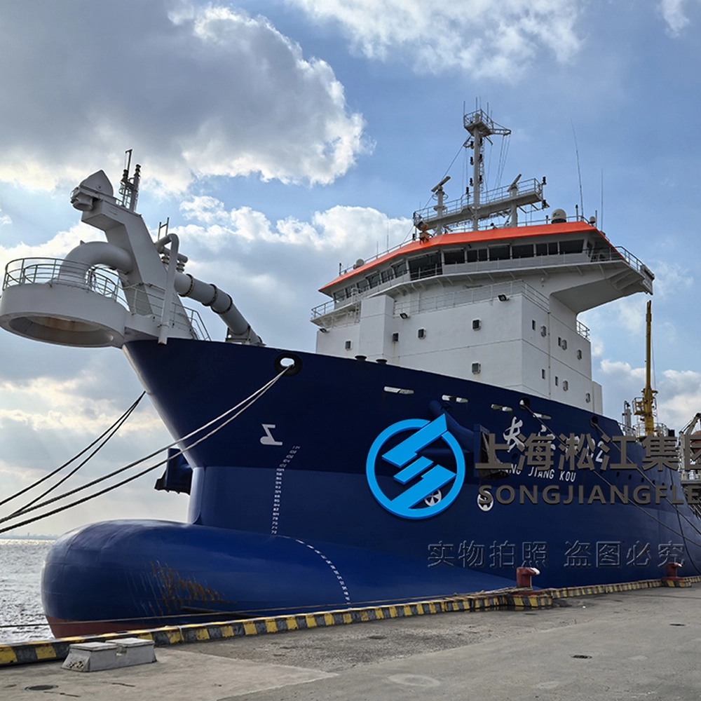 Commercial vessel deployed at sea utilizing heavy duty marine rubber compensators within its central engine room and hull drainage systems