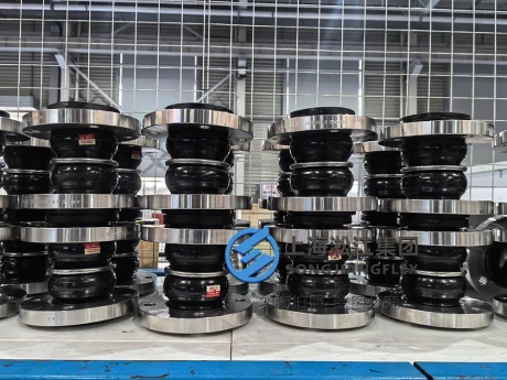 Front view technical photo of a premium double-sphere rubber compensator showcasing the symmetrical dual-convoluted geometry and center reinforcing tie ring