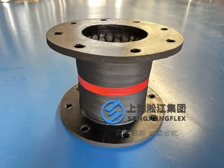 A heavy-duty ceramic lined rubber expansion joint with full rubber flange faces designed for highly abrasive slurry piping connections - 1.