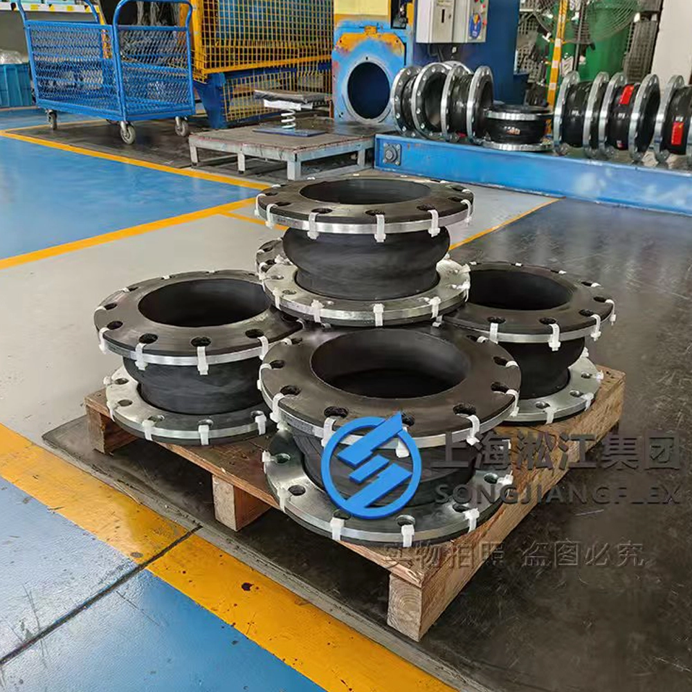 A batch of high-dielectric insulated rubber compensators with carbon steel backing rings and insulated bolt sleeves ready for industrial piping installation