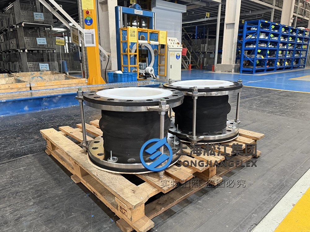 Hand-built DN300 FKM rubber expansion joint with PTFE liner and Gr5 titanium flanges on wooden pallet - 02