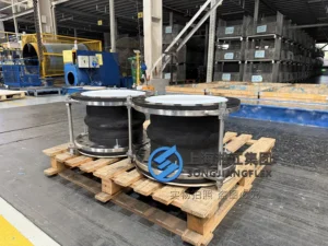Hand-built DN300 FKM rubber expansion joint with PTFE liner and Gr5 titanium flanges on wooden pallet - 03