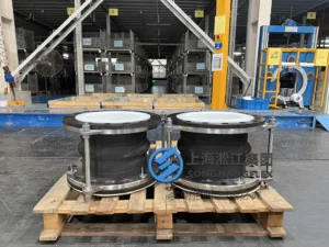 Hand-built DN300 FKM rubber expansion joint with PTFE liner and Gr5 titanium flanges on wooden pallet