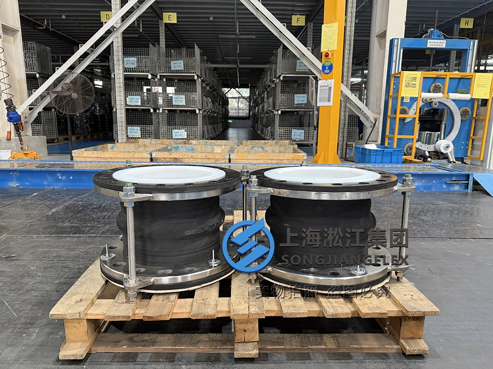 Hand-built DN300 FKM rubber expansion joint with PTFE liner and Gr5 titanium flanges on wooden pallet