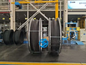 Hand-built DN1200 single-arch Hypalon rubber compensator with a white internal PTFE liner, vacuum support ring, full face sealing profile, galvanized carbon steel flanges, and an integral control unit rod system - 02.