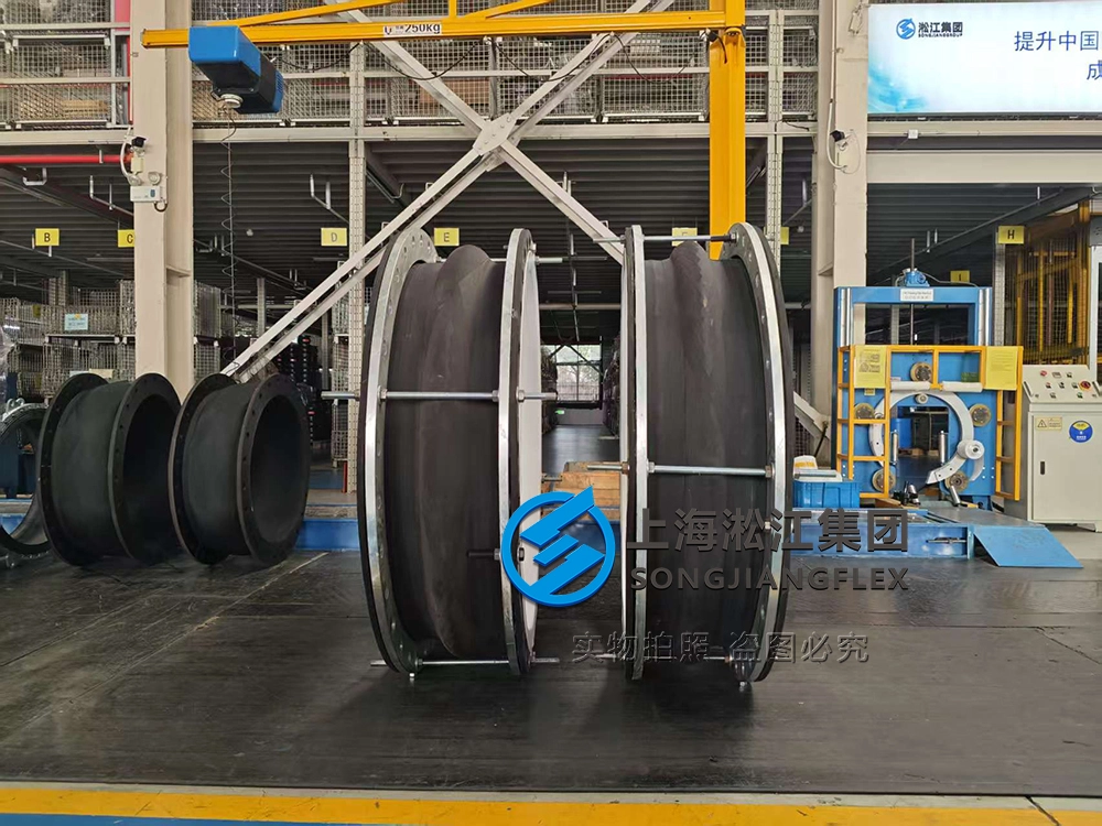 Hand-built DN1200 single-arch Hypalon rubber compensator with a white internal PTFE liner, vacuum support ring, full face sealing profile, galvanized carbon steel flanges, and an integral control unit rod system - 02.